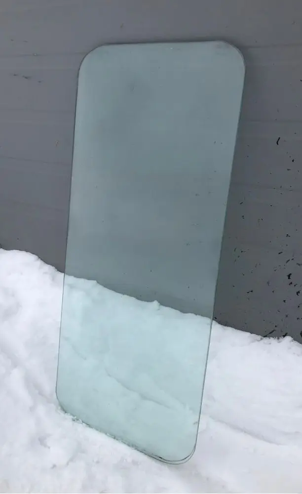 Стекло двери верхнее 225.34.00.00.002 от автогрейдера ДЗ-143