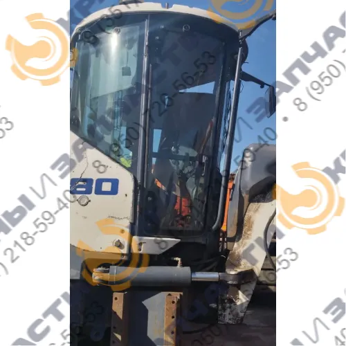 Стекло двери левое автогрейдера Terex TG180