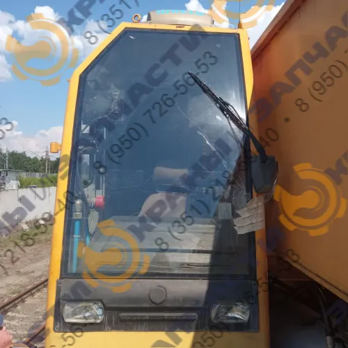 Стекло лобовое гнутое  62-170000-002 810х1430 для кабины ж/д крана КЖ-1572