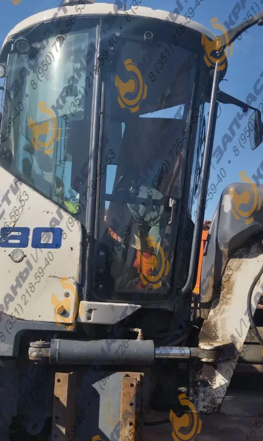 Стекло двери левое автогрейдера Terex TG180